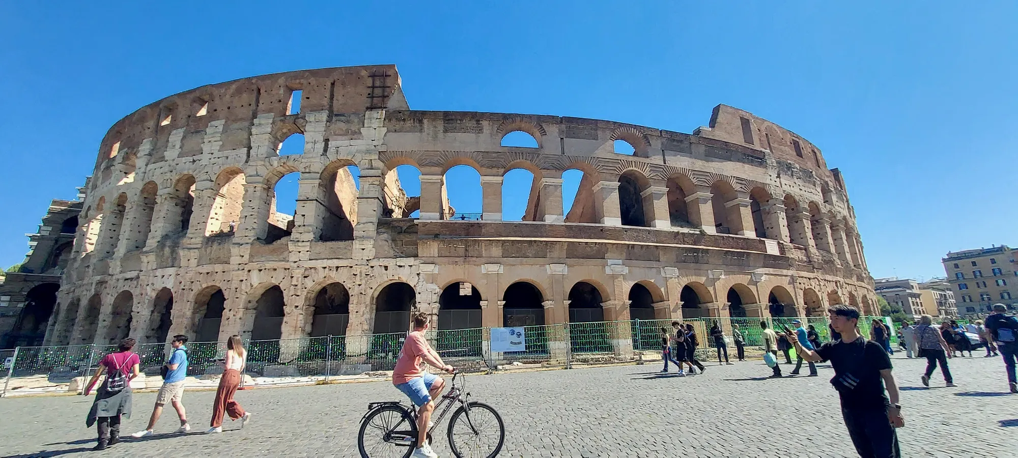 Cycling Past the Colosseum